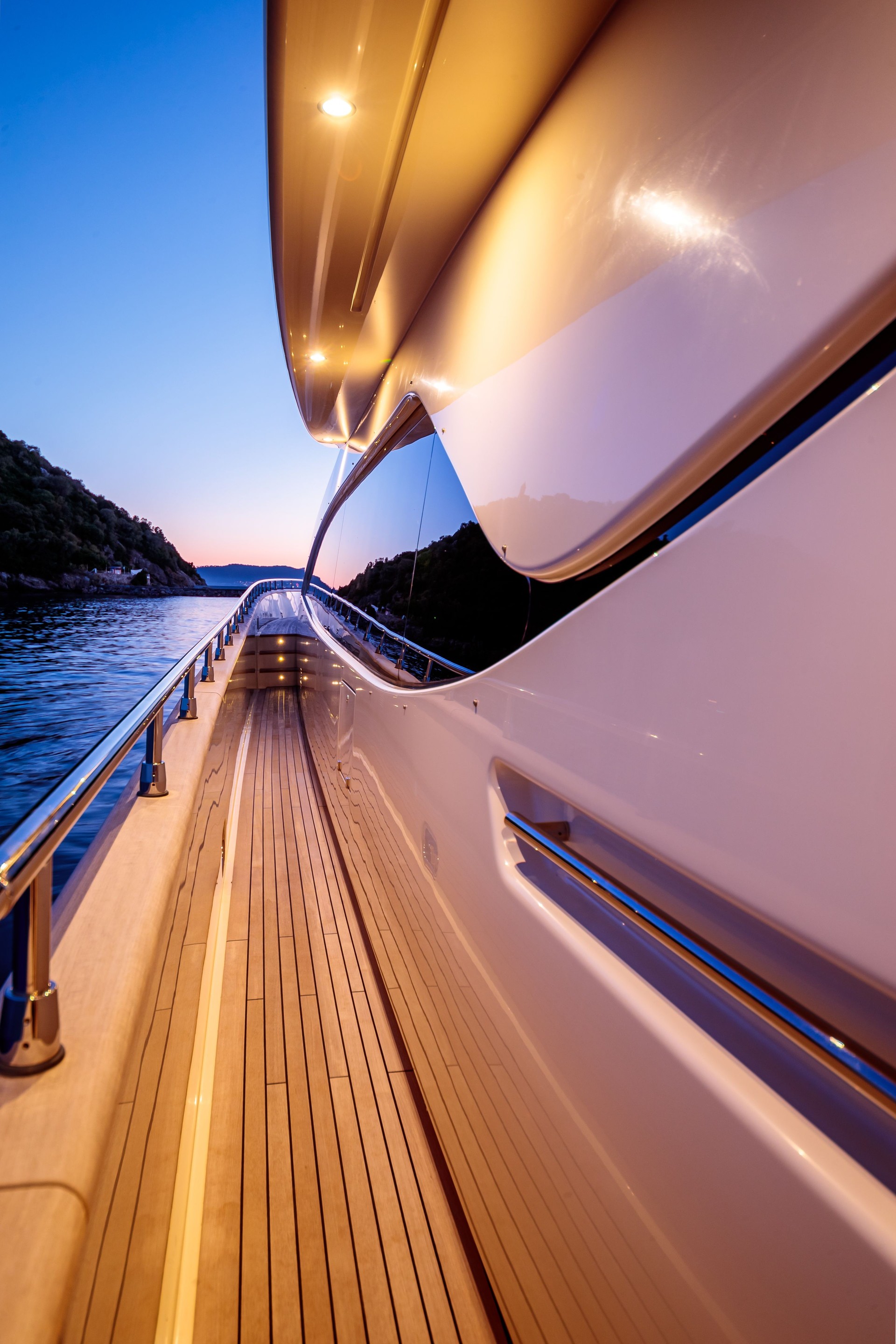 Vertical shot form the yacht of the sea under a dark blue sky